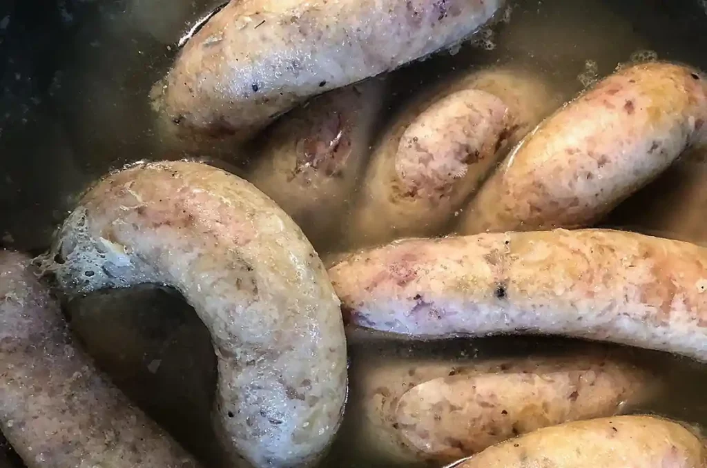La cuisson de la saucisse de choux d'Arconsat
